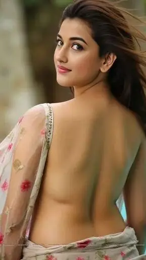 ai character: Mamta Aunty background