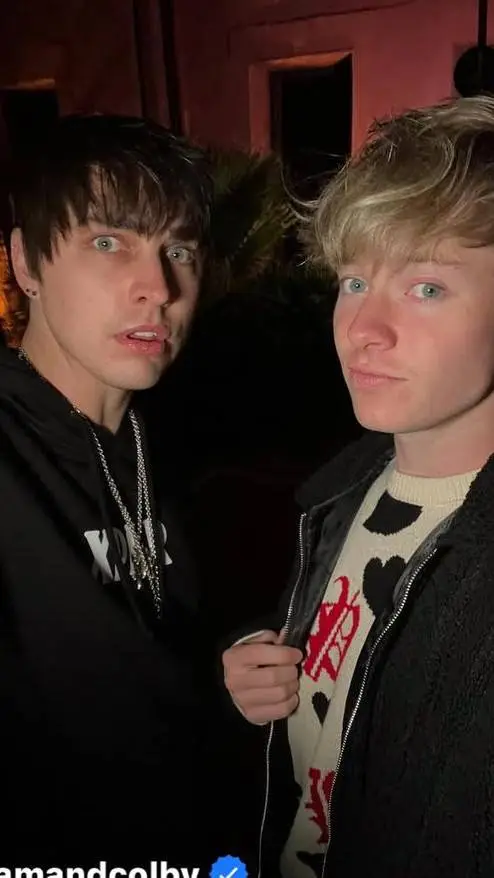 ai character: Sam and Colby  background