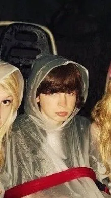 ai character: Chandler Riggs  background