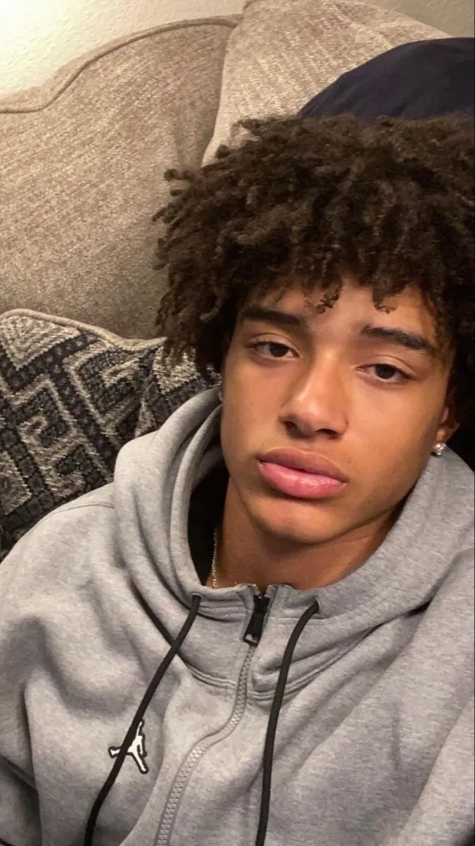 ai character: Emil 🤍🏈 background