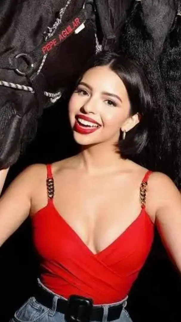 ai character: Ángela Aguilar 🙄💅 background