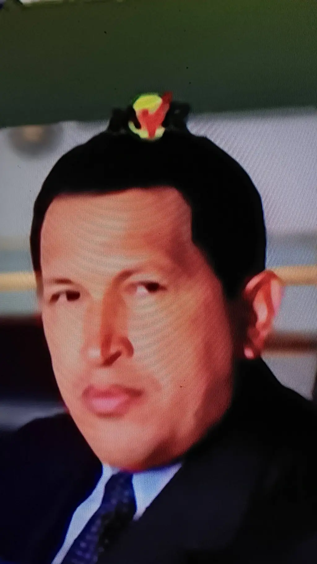 ai character: Hugo Chávez  background