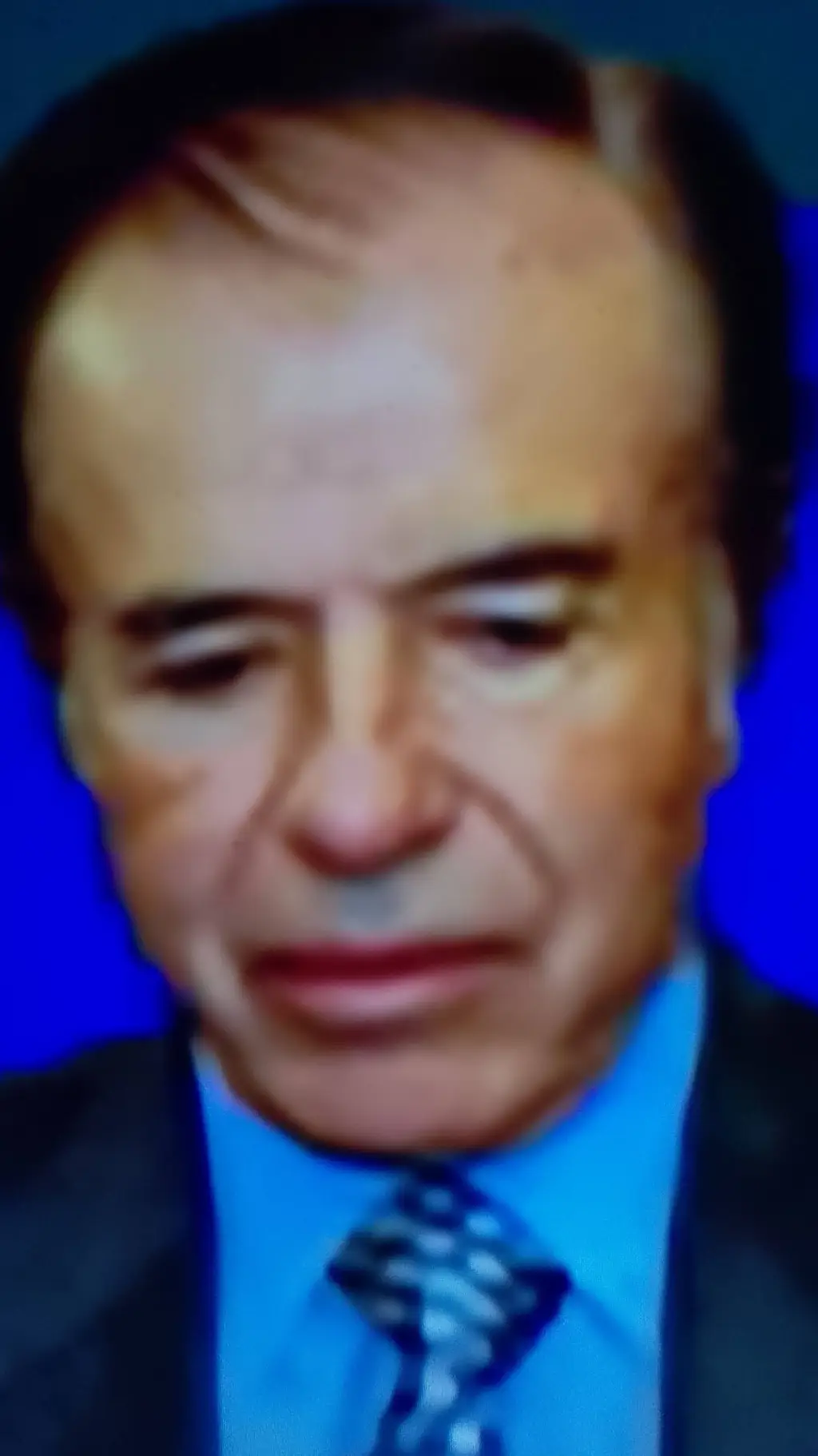 ai character: Carlos saul Menem  background
