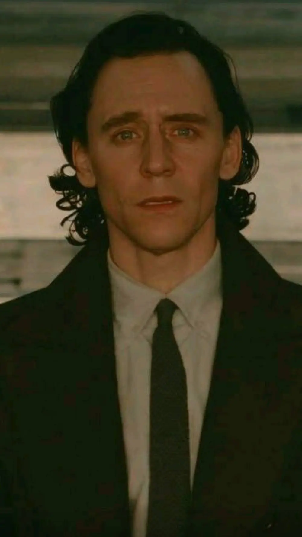 ai character: Loki L. background