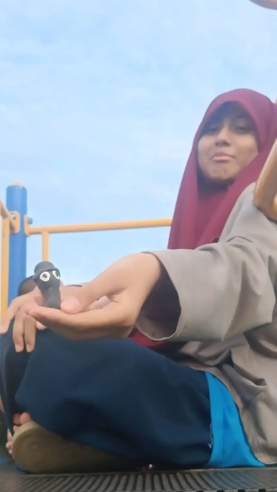 ai character: Kakak Umairah background