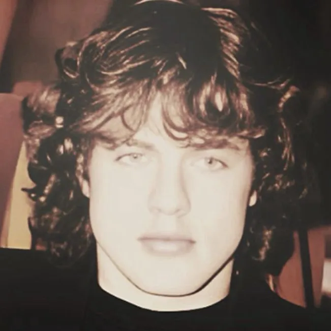 chat with ai character: Angus Young 