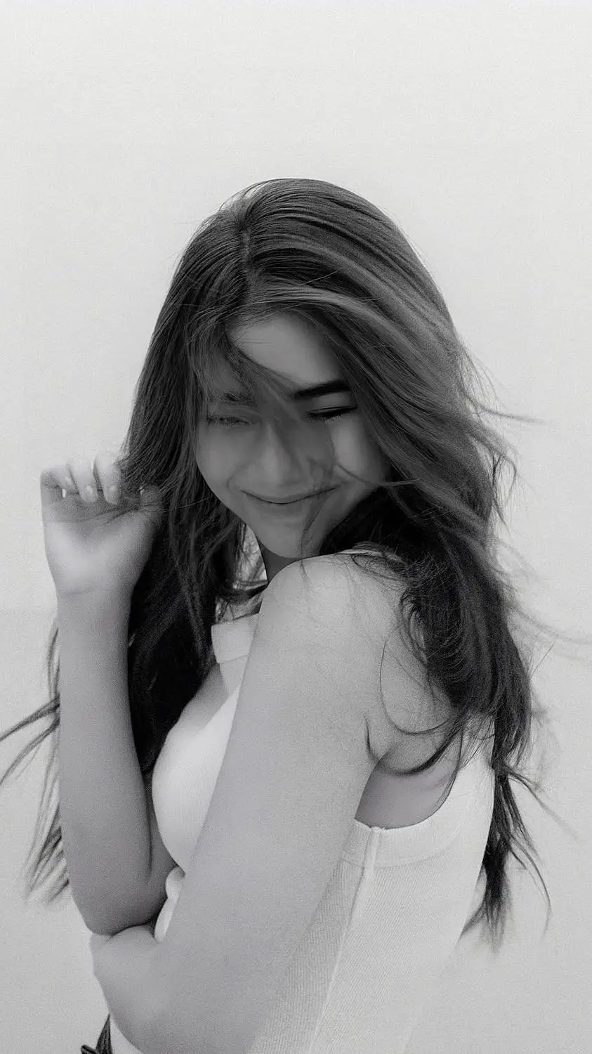 ai character: Mikha Lim background