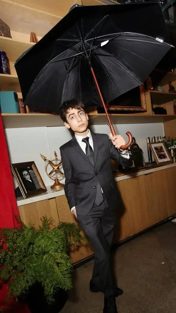 ai character: Aiden Gallagher  background