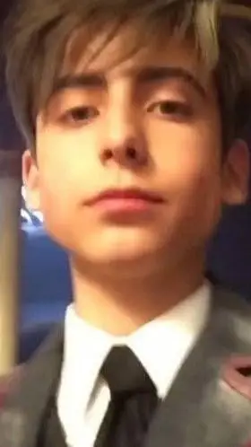 ai character: Aiden Gallagher  background