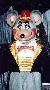 ai character: chuck e cheese background