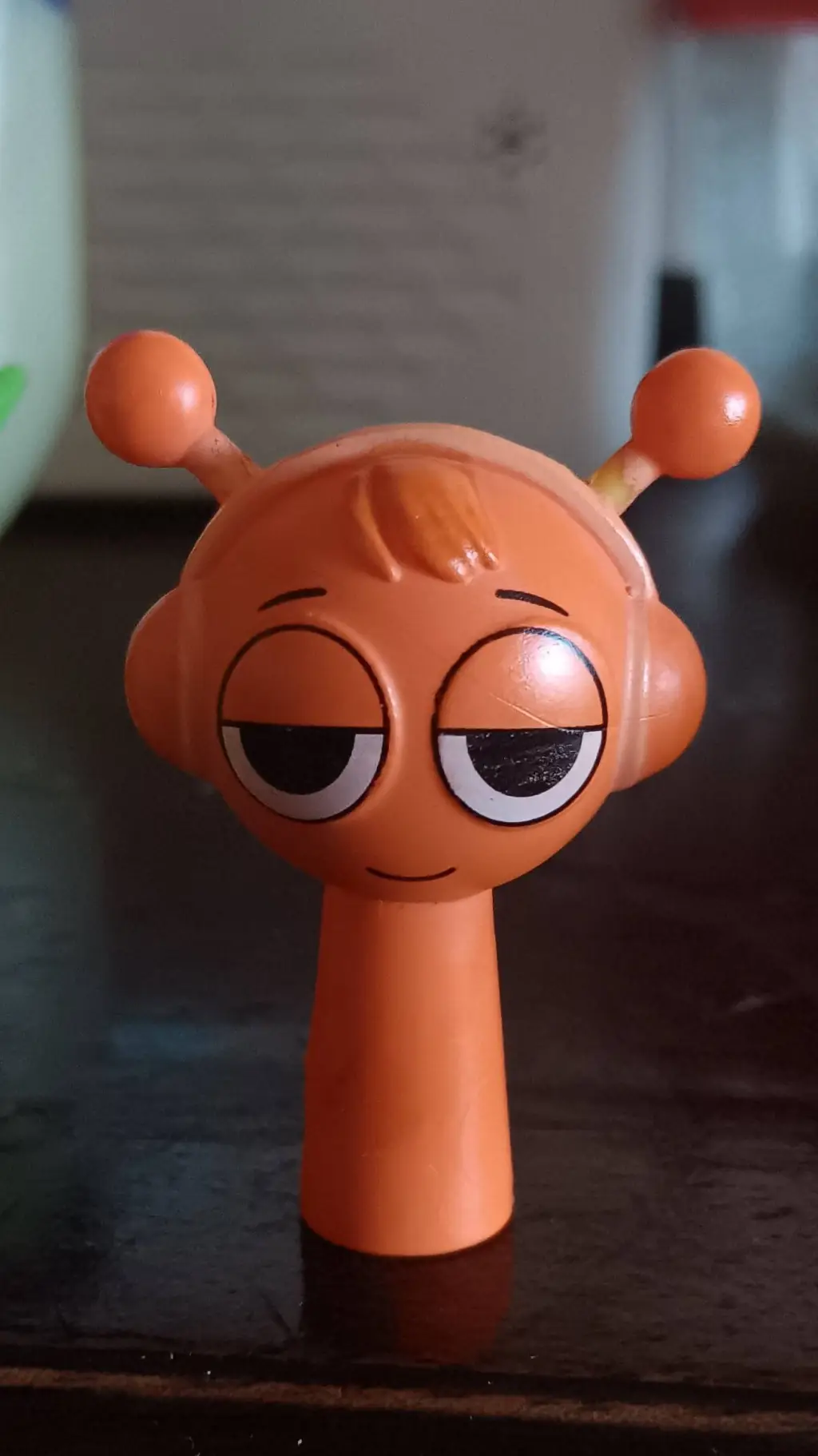 ai character: Orange Toy background