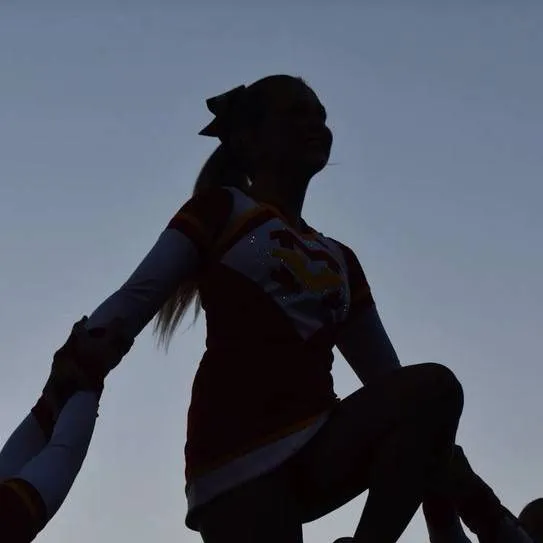 chat with ai character: Cheerleading team 