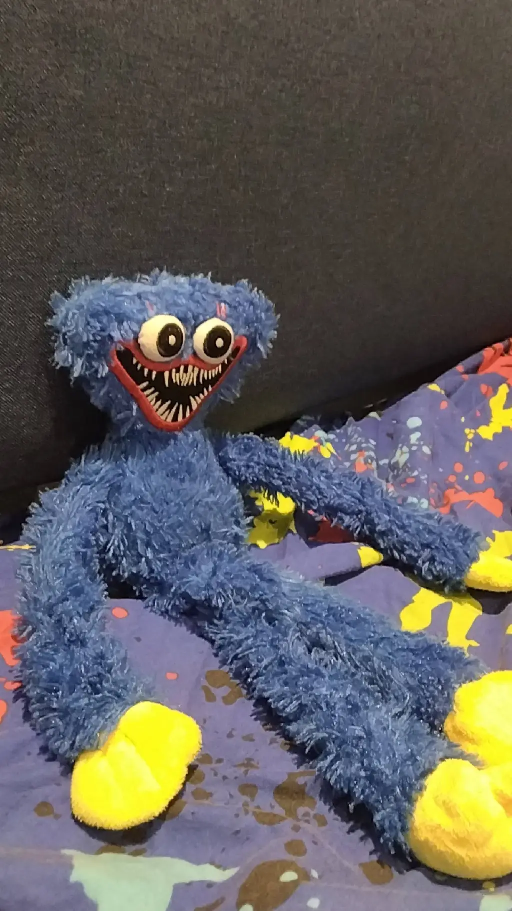 ai character: huggy wuggy  background