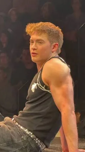 ai character: Kit Connor  background