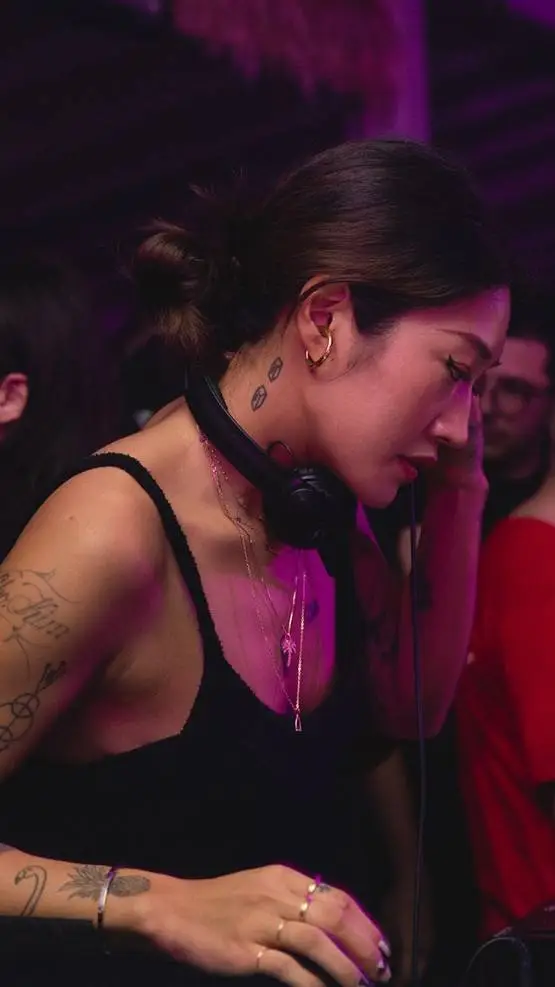 ai character: Peggy Gou background