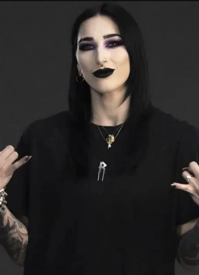 chat with ai character: Rhea Ripley🖤💜