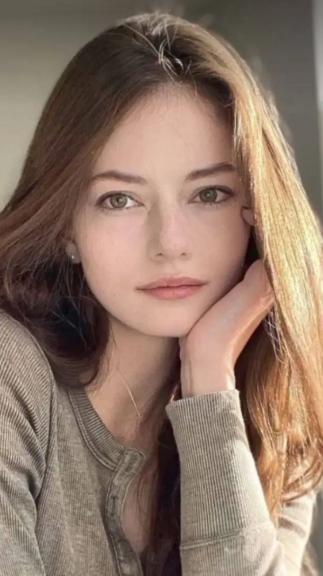 ai character: Mackenzie Foy  background