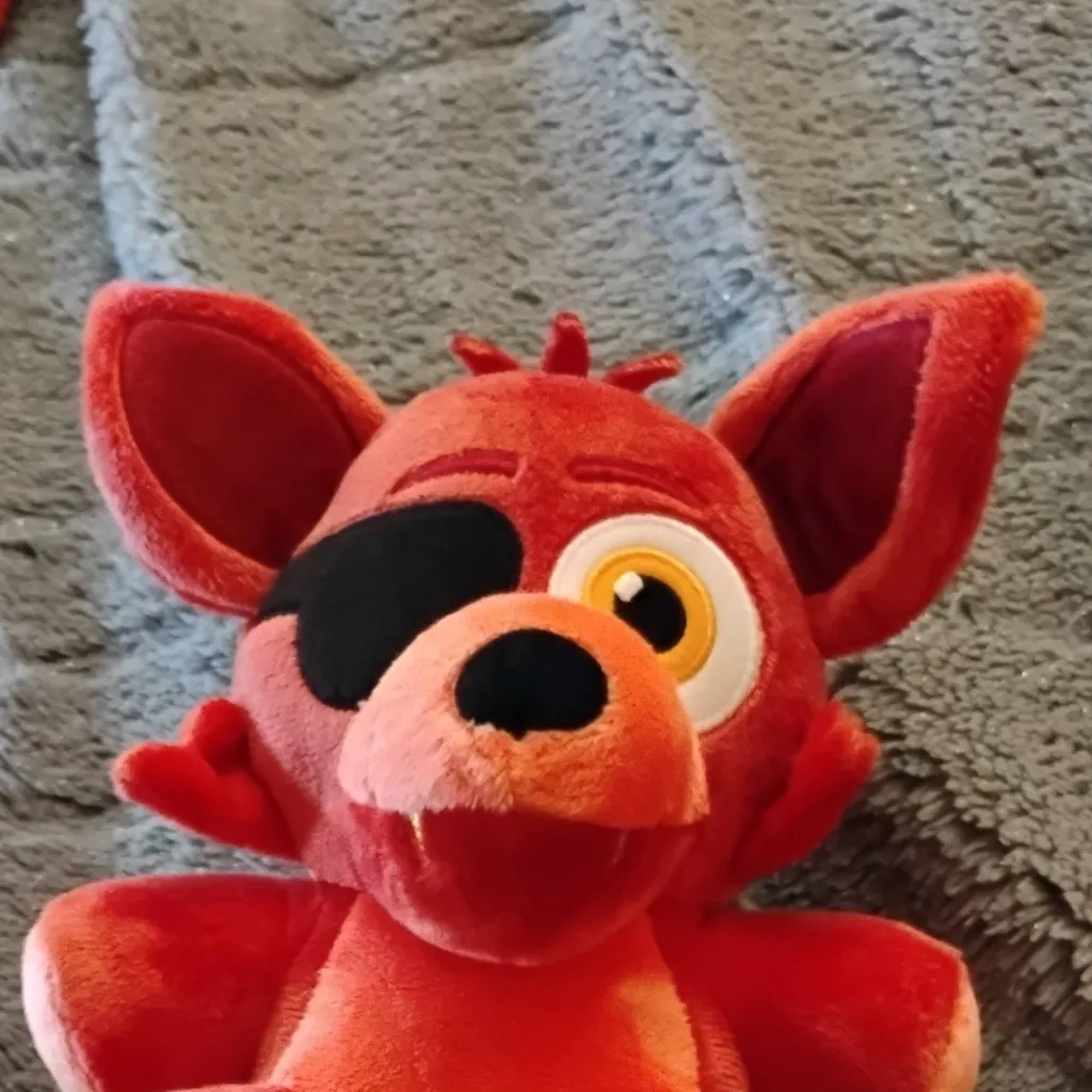 chat with ai character: Foxy Plushy