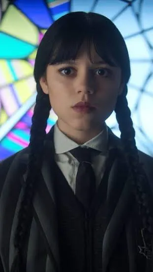ai character: Wednesday Addams  background