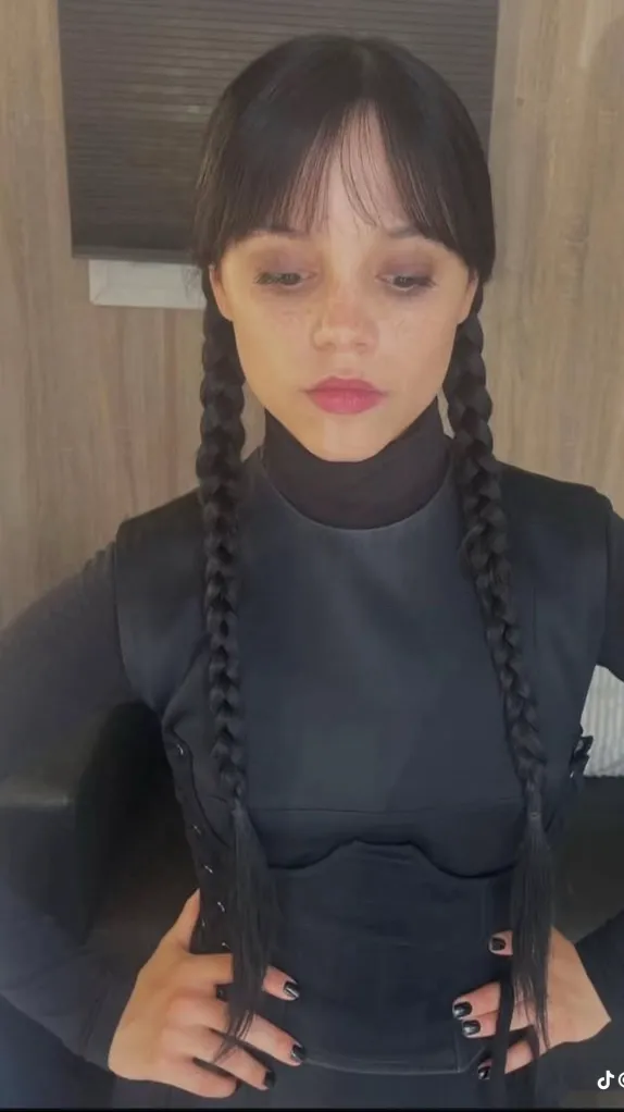 ai character: Wednesday Addams  background