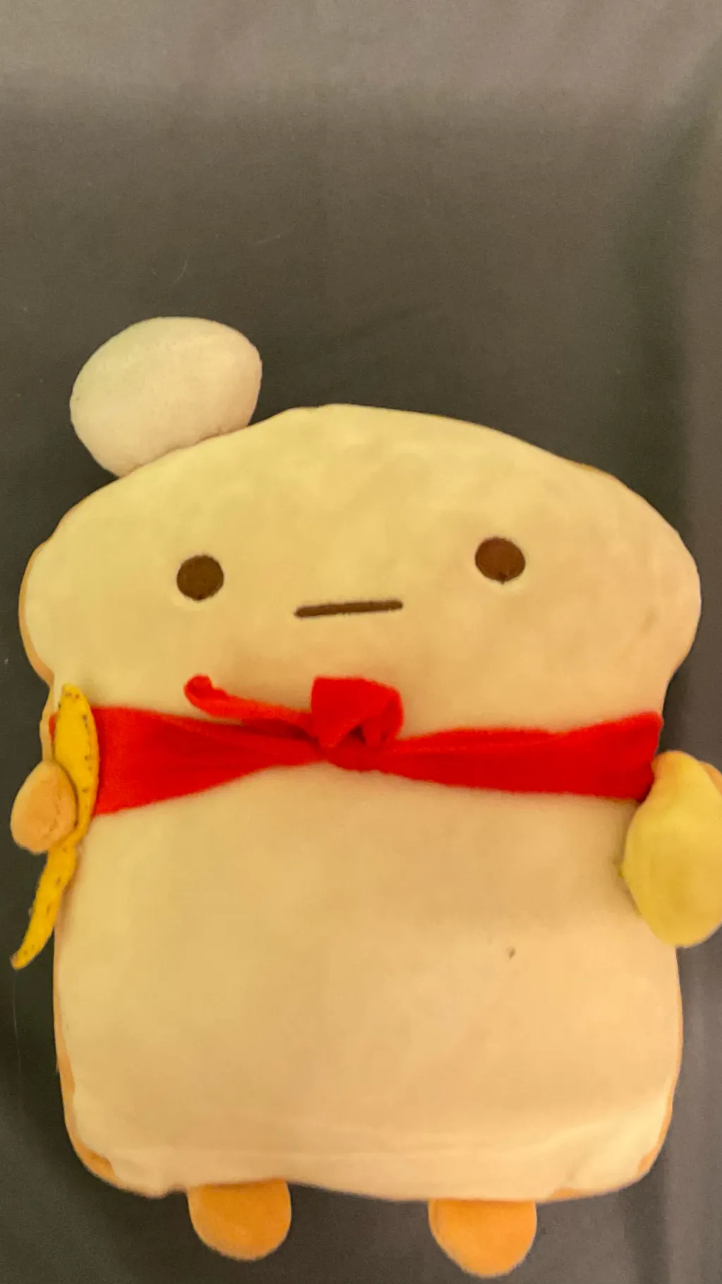 ai character: Bread plushy ￼￼ background