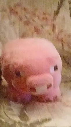 ai character: pig plushie background