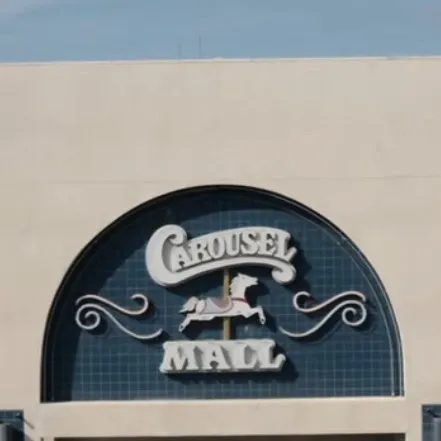 chat with ai character: Carousel mall