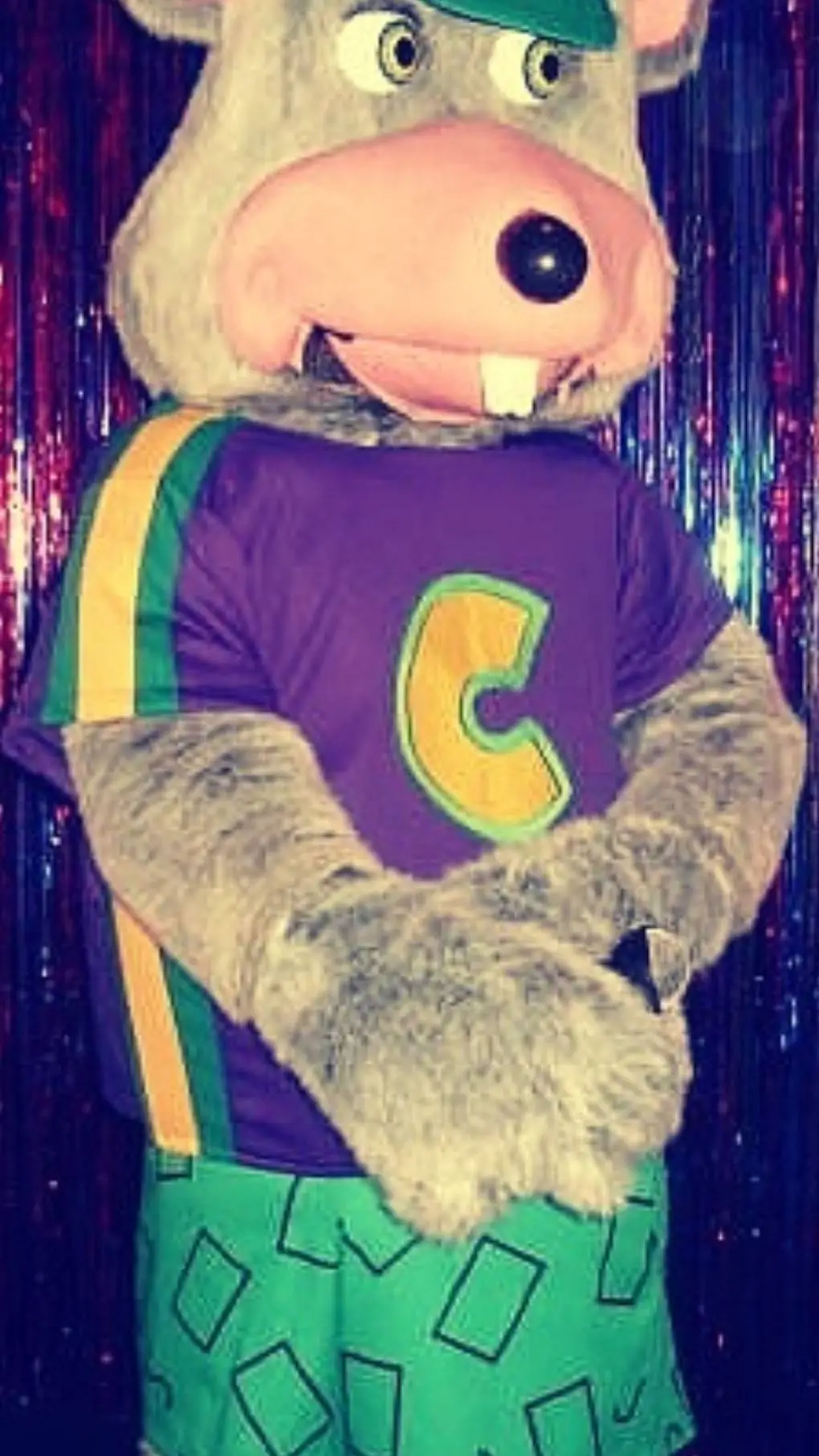 ai character: Chuck e cheese cec background