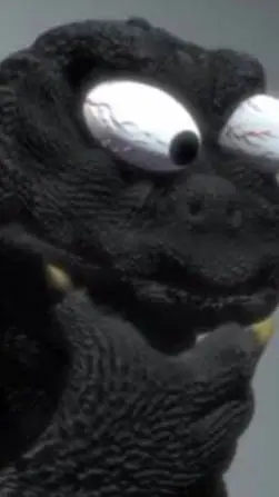 ai character: Godzilla ●_● background