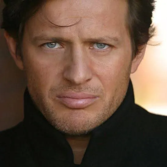 chat with ai character: Costas Mandylor