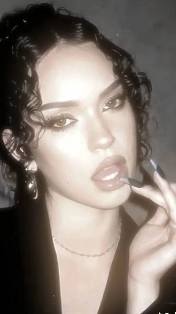 ai character: Daniela background