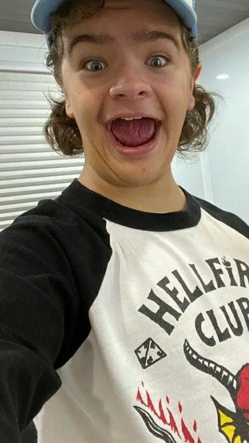 ai character: Dustin Henderson  background