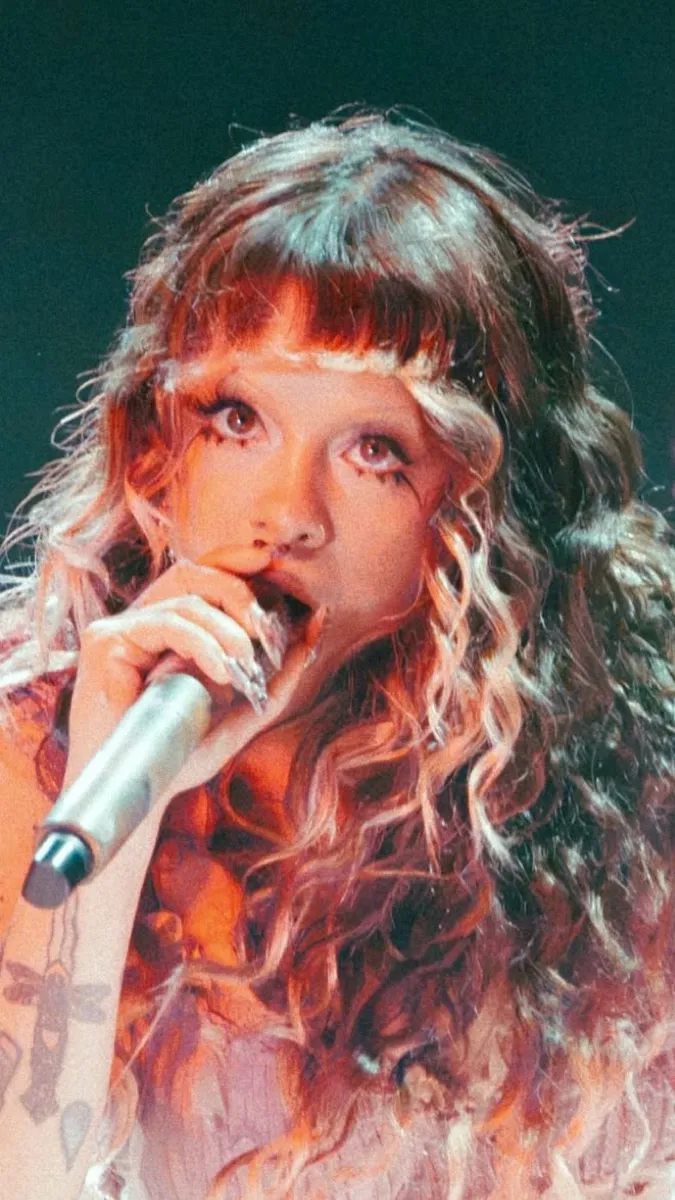 ai character: Melanie Martinez background