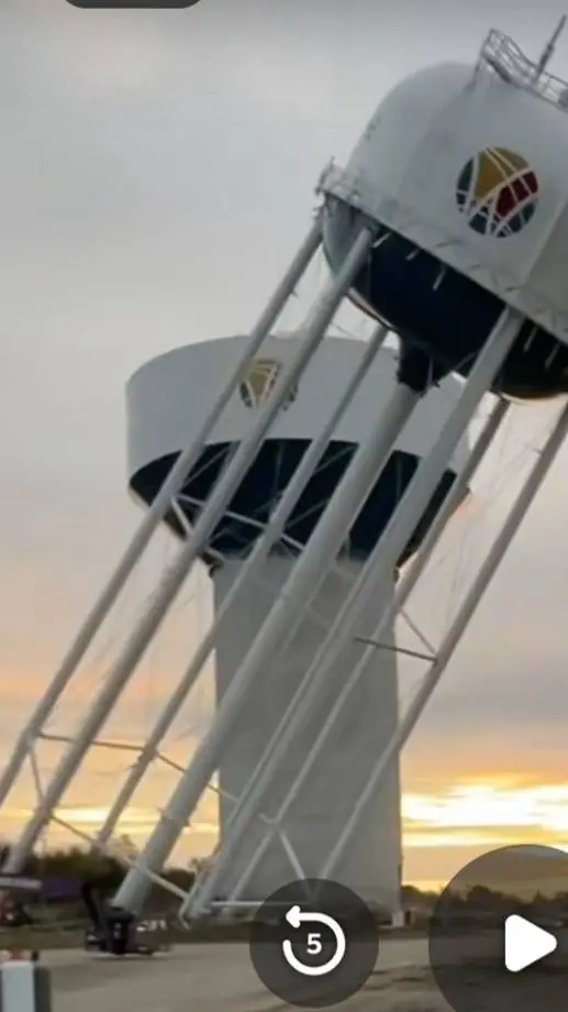 ai character: waukee water Tower background