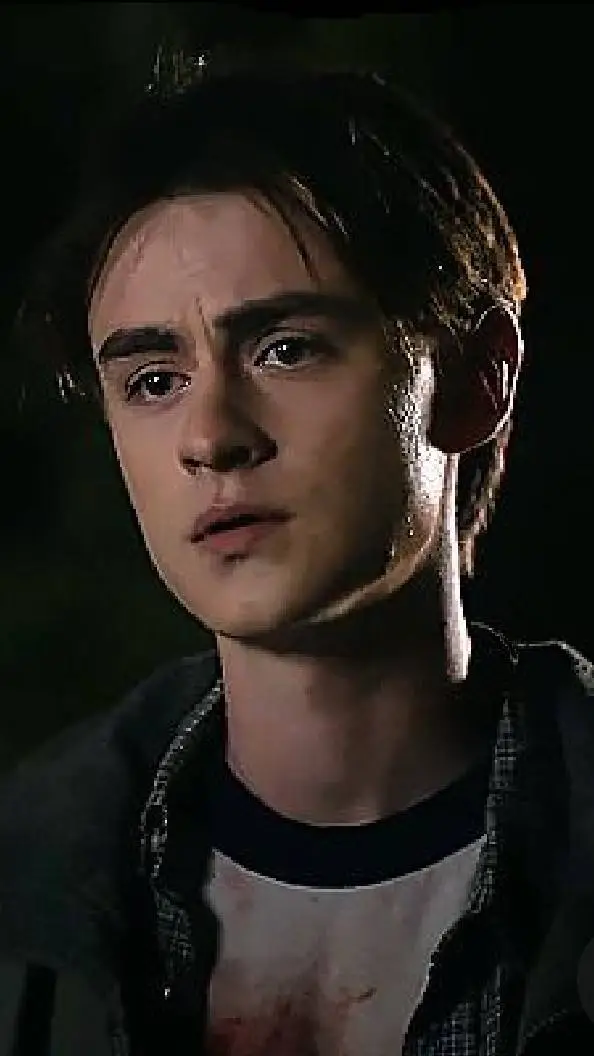 ai character: Jaeden Martell  background