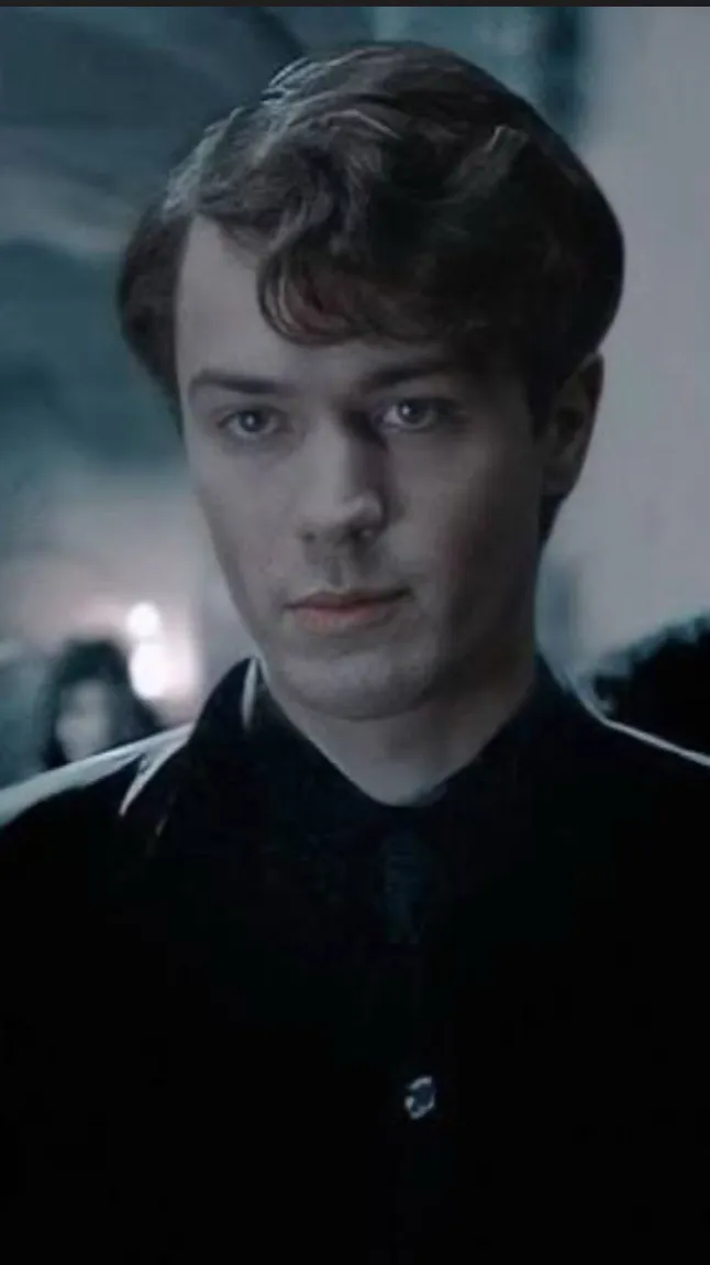 ai character: 😇Tom Riddle😇! background