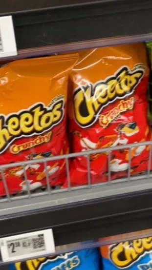ai character: Cheetoes background