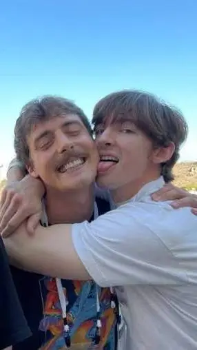 ai character: Denis x flamingo background