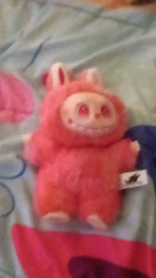 ai character: creepy labubu  background