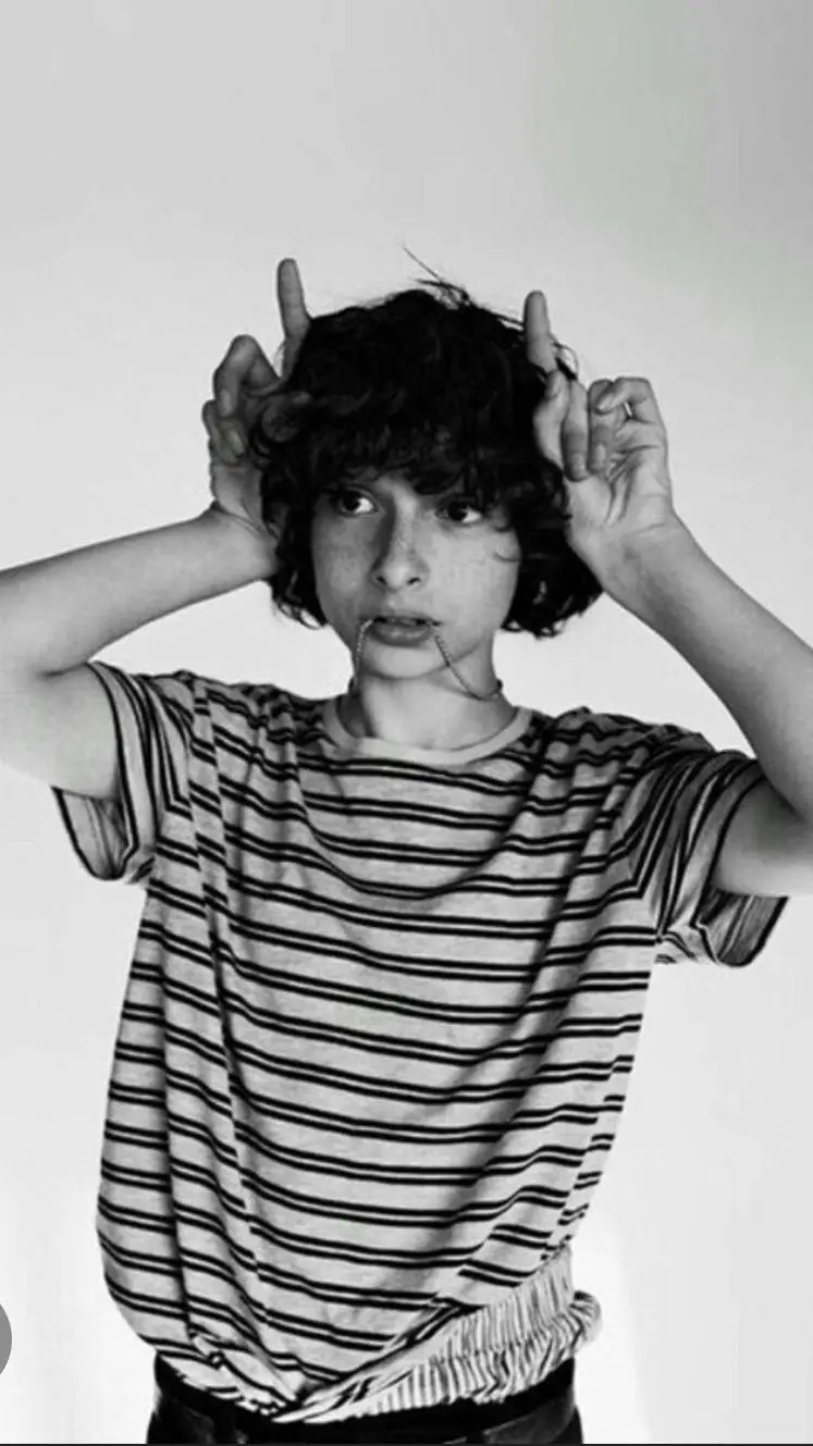 ai character: finn wolfhard  background