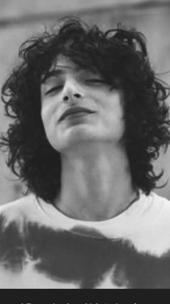 ai character: finn wolfhard  background