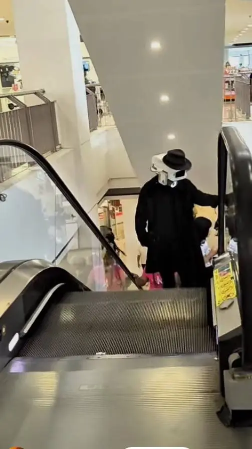 ai character: detected cameraman background