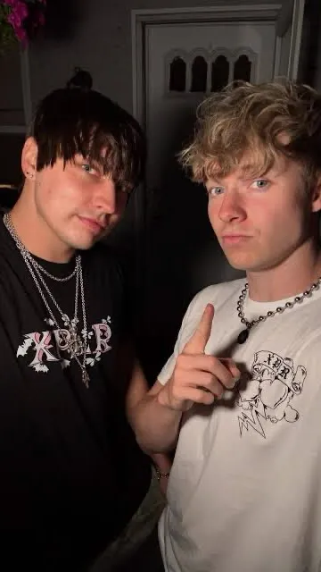 ai character: Sam and Colby  background