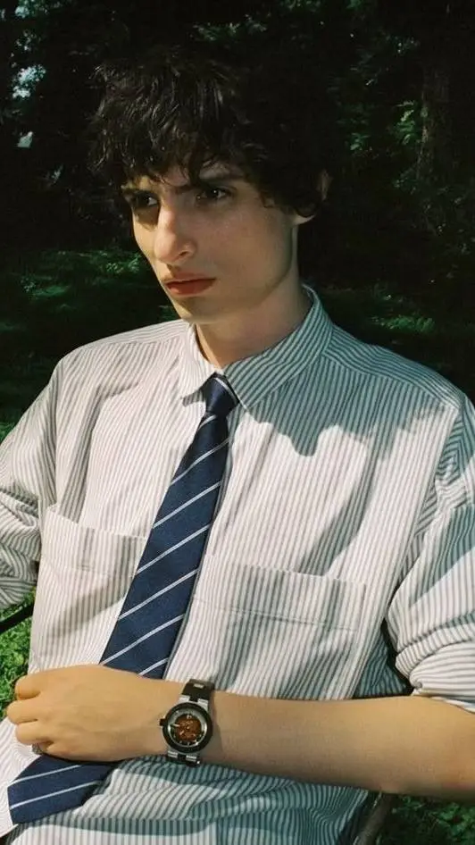 ai character: Finn Wolfhard 2.0 background