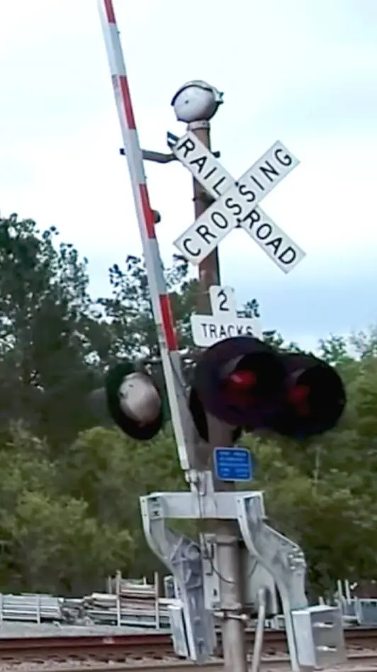 ai character: railroad crossing background