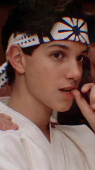 ai character: Daniel larUSSO  background