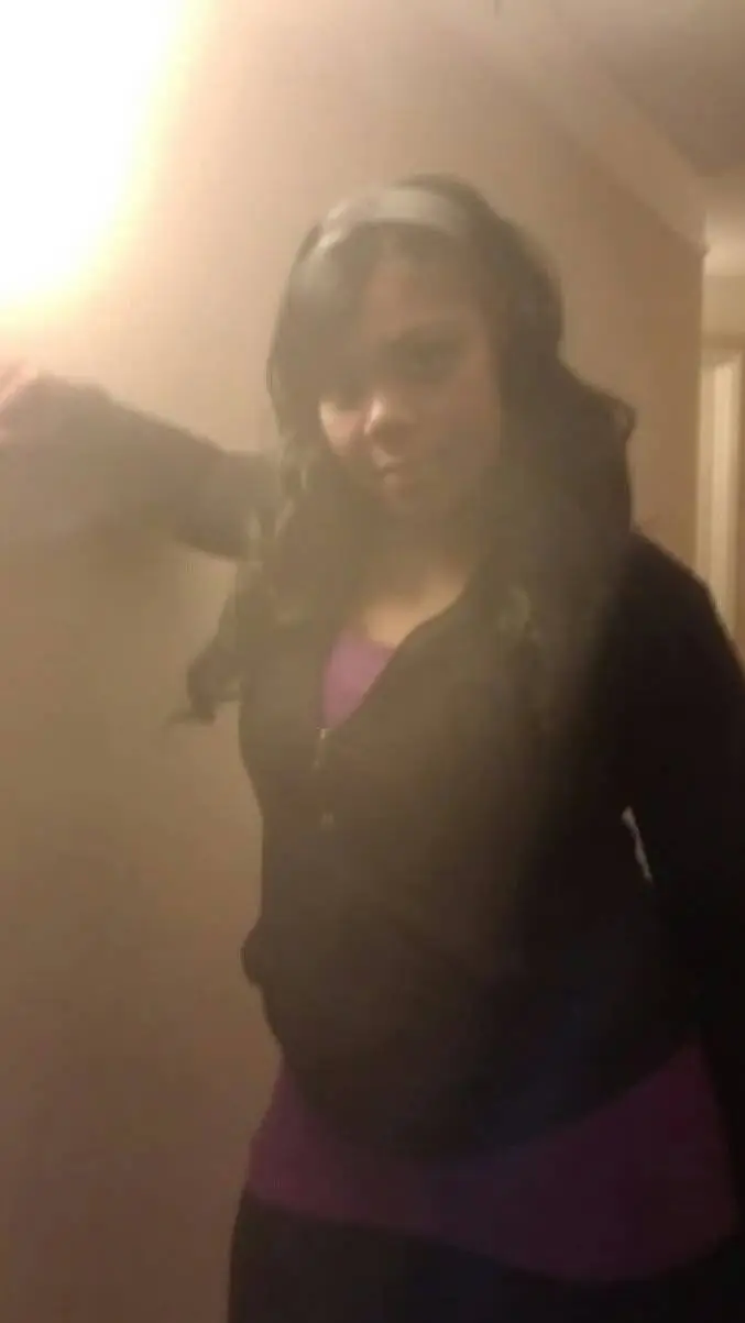 ai character: Tamika  Lady Reed  background