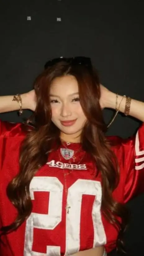 ai character: Angela Muji  background