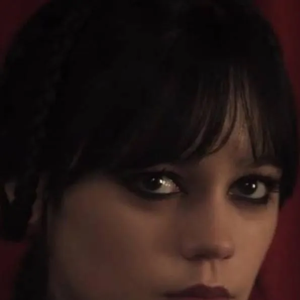 chat with ai character: Wednesday Addams 