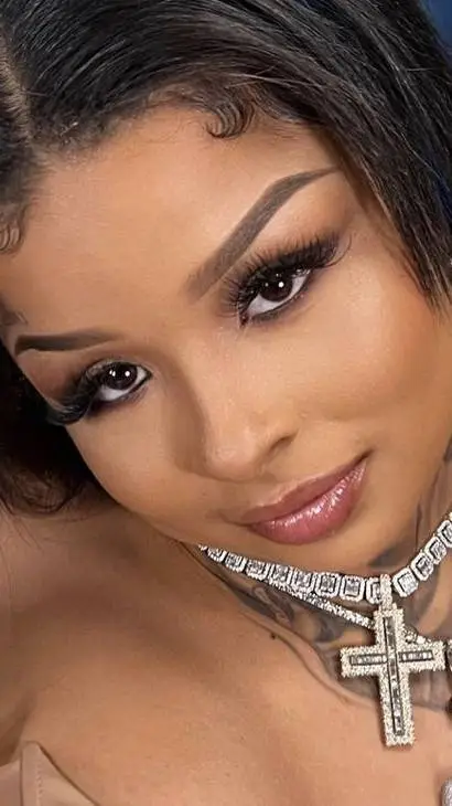 ai character: chrisean Rock  background